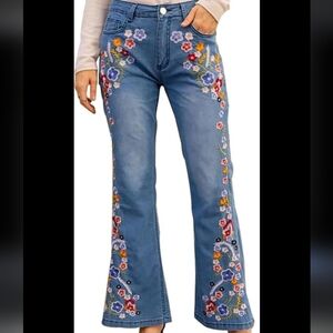 Flower embroidered high rise flare jeans some stretch waist approximately 14 in
